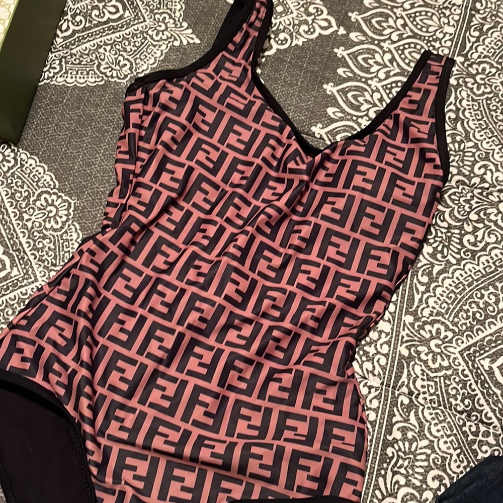Size medium swimsuit, fits like size small.